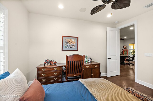 bedroom featuring dark wood-type flooring and ceiling fan