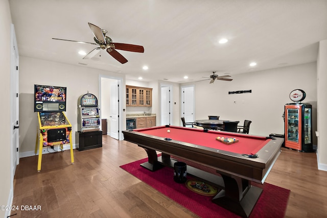 playroom with hardwood / wood-style flooring, ceiling fan, billiards, and indoor bar