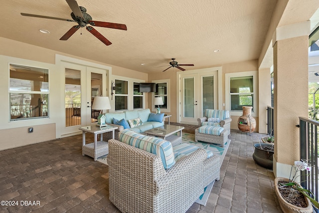 view of patio / terrace featuring ceiling fan, outdoor lounge area, and french doors