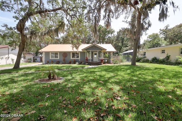 single story home with a front yard