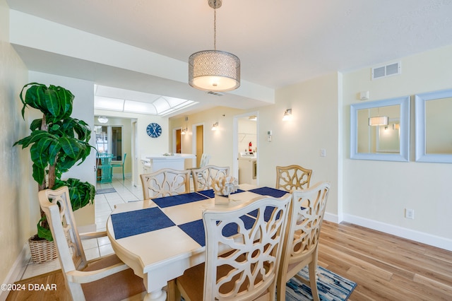 dining area featuring light hardwood / wood-style floors