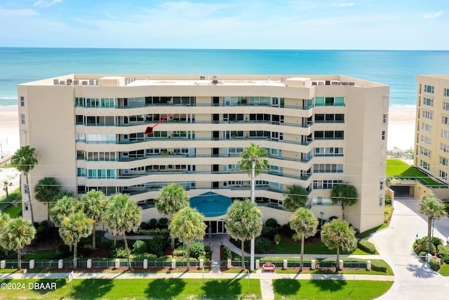 view of property with a water view