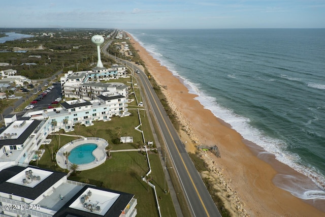 bird's eye view with a view of the beach and a water view