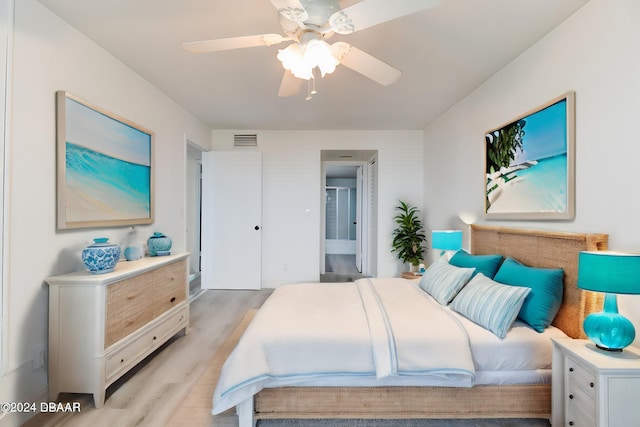 bedroom featuring ceiling fan and light hardwood / wood-style floors