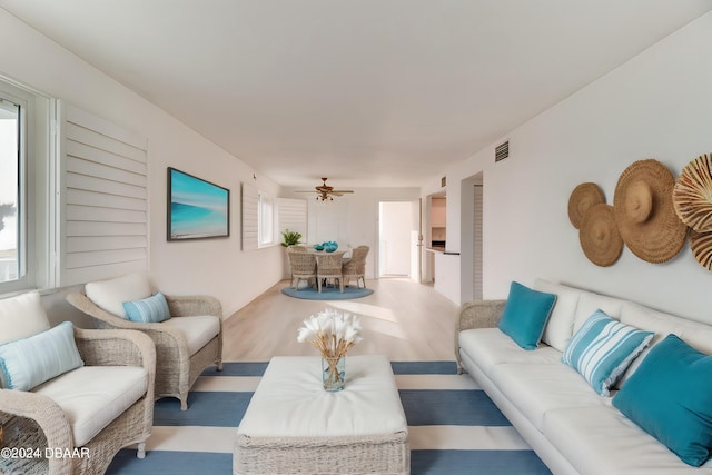 living room with ceiling fan