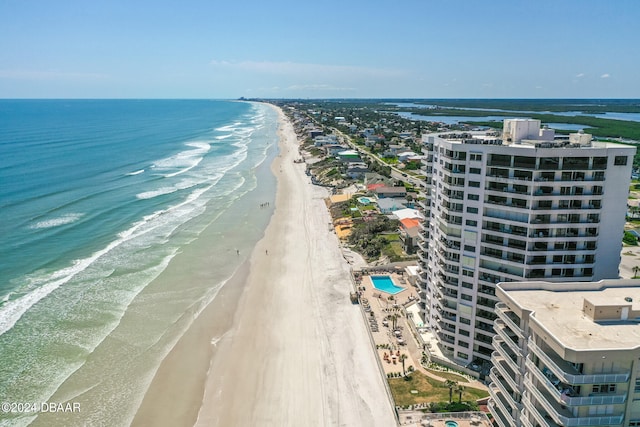 aerial view with a view of the beach and a water view