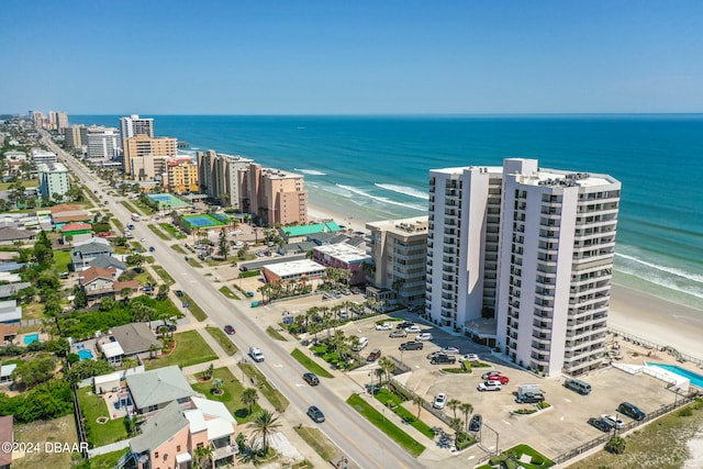 drone / aerial view with a view of the beach and a water view