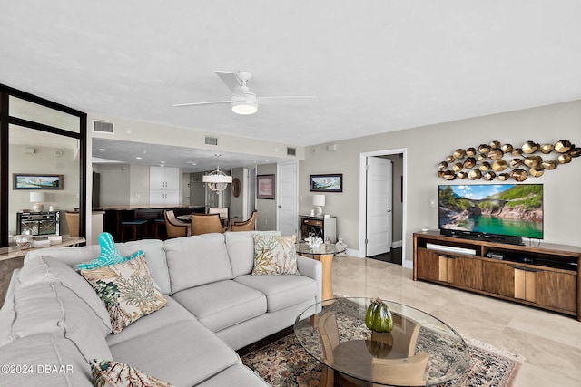 living room with ceiling fan