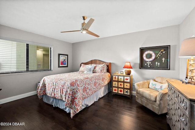 bedroom featuring dark wood-type flooring and ceiling fan