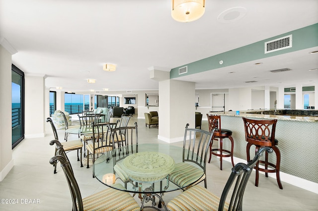 dining room with a water view