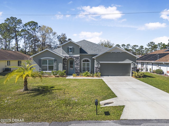 view of front of house featuring stucco siding, an attached garage, a front yard, stone siding, and driveway