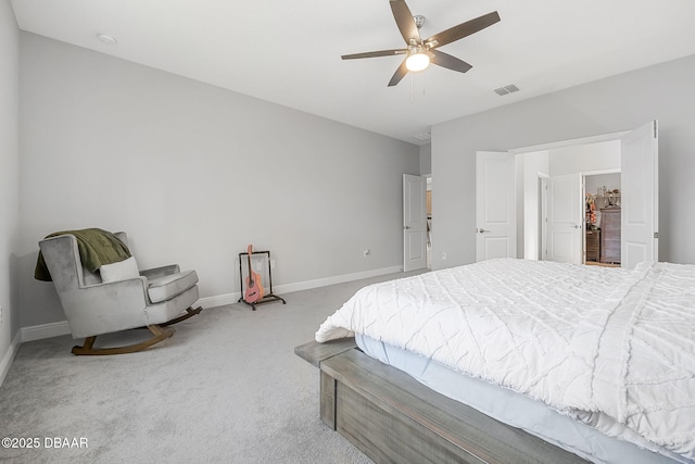 bedroom featuring carpet floors, visible vents, baseboards, and a ceiling fan