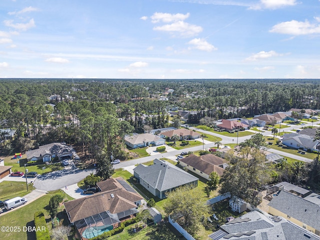 birds eye view of property with a residential view