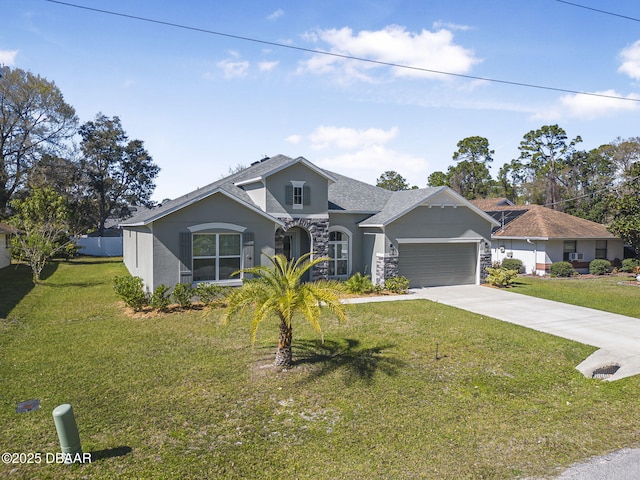 view of front of property featuring stucco siding, concrete driveway, an attached garage, stone siding, and a front lawn