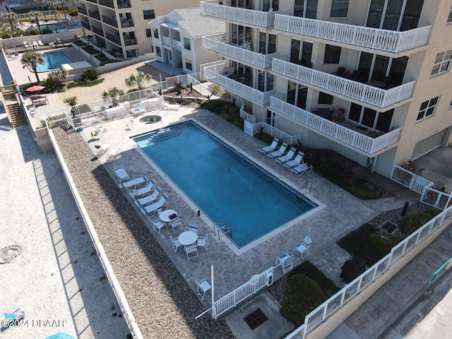 community pool with a patio