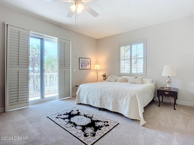 bedroom featuring a ceiling fan, access to outside, light carpet, and baseboards