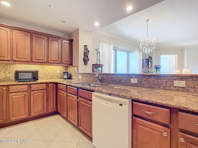 kitchen featuring a sink, light stone countertops, black microwave, and dishwasher