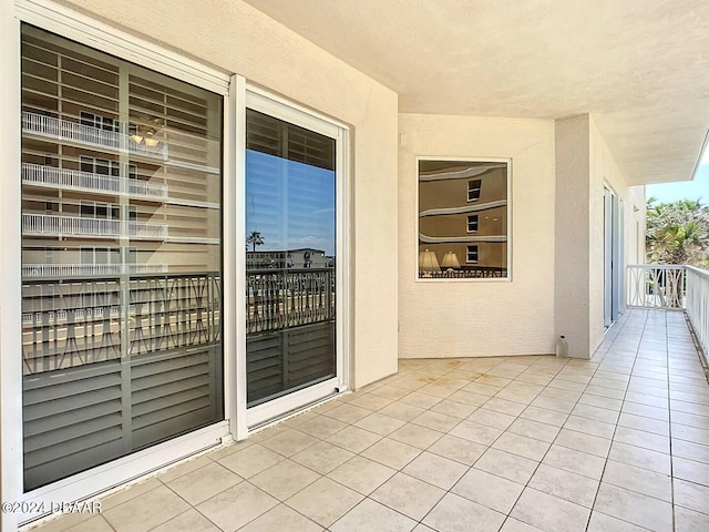 view of patio / terrace with a balcony