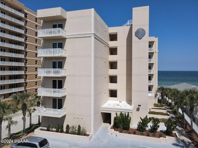 view of building exterior with a water view