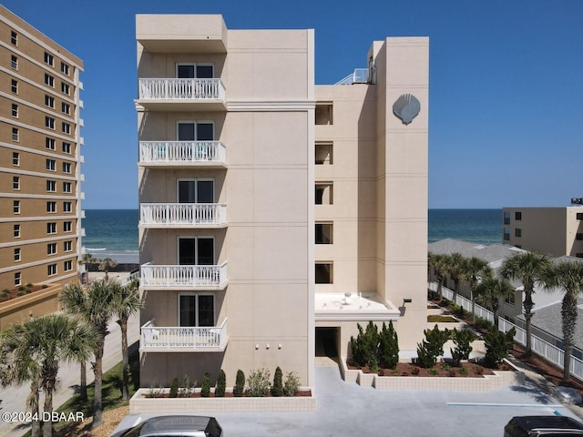 view of property with a water view