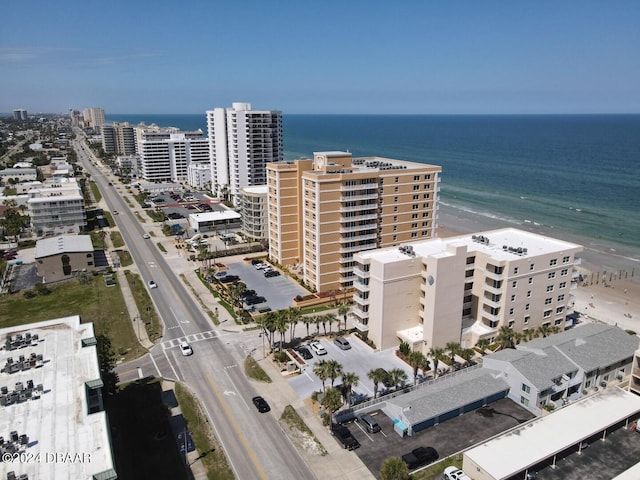 aerial view featuring a beach view and a water view