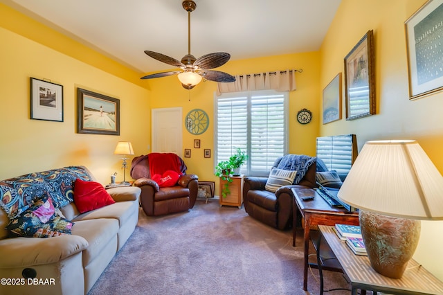 living room featuring ceiling fan and carpet flooring