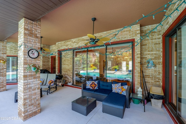 view of patio with an outdoor hangout area and ceiling fan