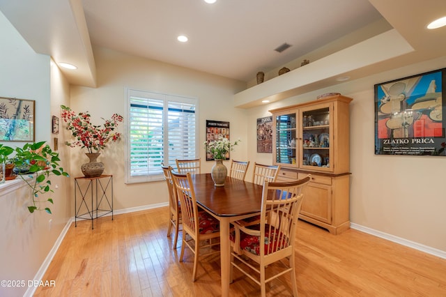 dining space featuring light hardwood / wood-style flooring