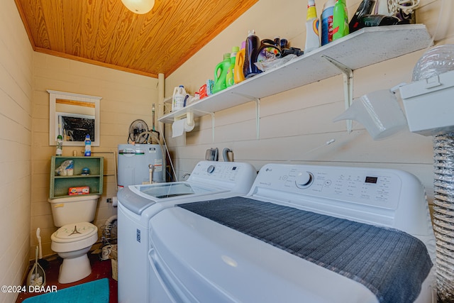 laundry room with water heater, washing machine and dryer, and wood ceiling