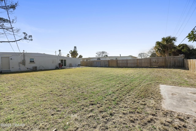 view of yard featuring central AC