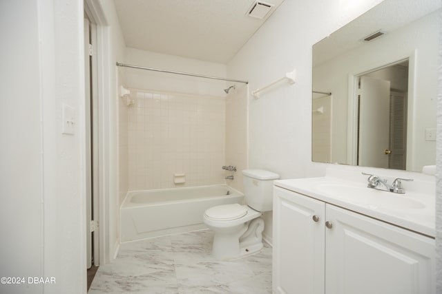 full bathroom featuring vanity, toilet, and tiled shower / bath combo