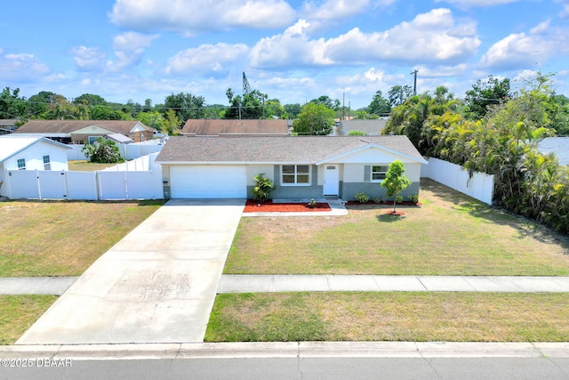 single story home featuring a gate, concrete driveway, and an attached garage