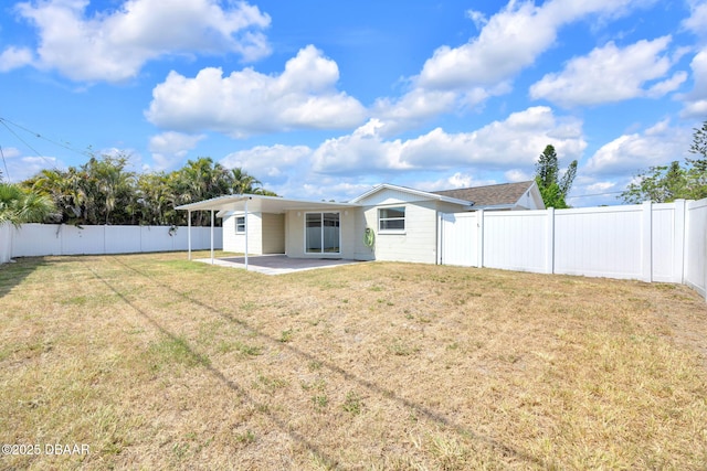 rear view of house with a patio area