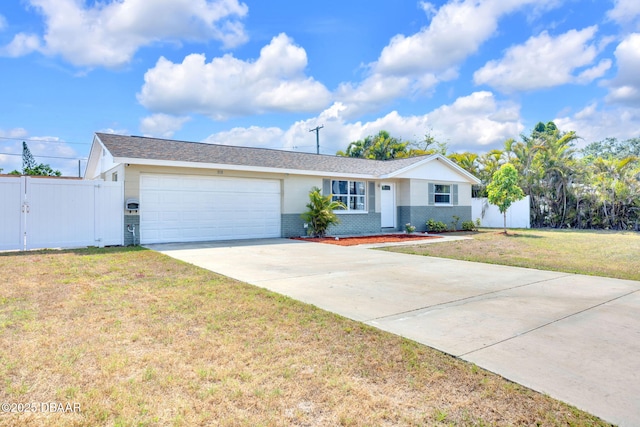 ranch-style house with a garage, brick siding, and concrete driveway