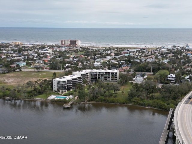 bird's eye view with a water view