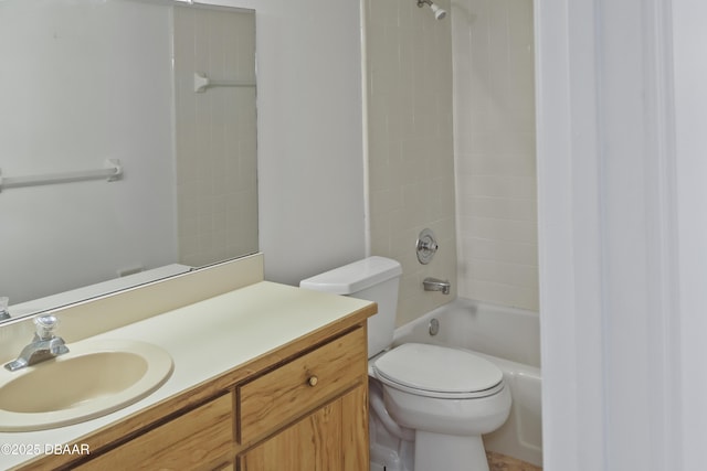 full bath featuring toilet, vanity, and bathing tub / shower combination