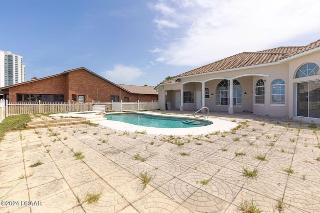 view of pool with a patio area