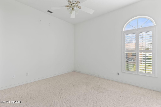 unfurnished room featuring ceiling fan