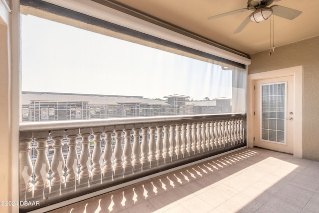 balcony featuring ceiling fan