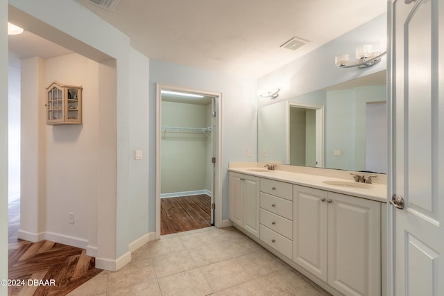 bathroom featuring vanity and tile patterned floors