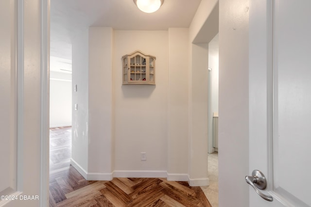 hall with parquet flooring