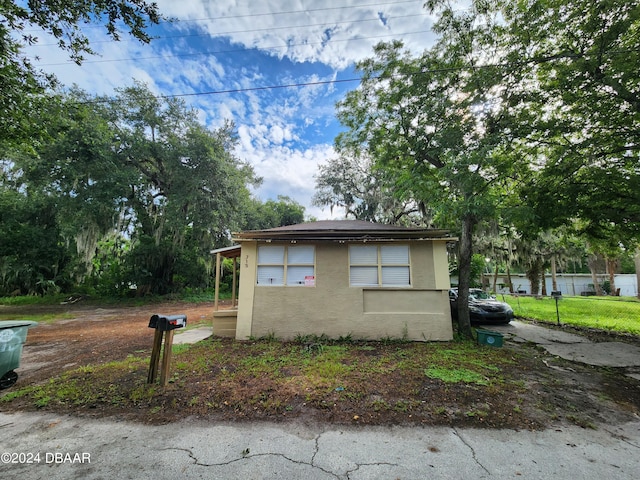 view of property exterior with stucco siding