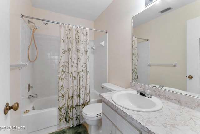 bathroom with visible vents, toilet, shower / bath combo with shower curtain, and vanity