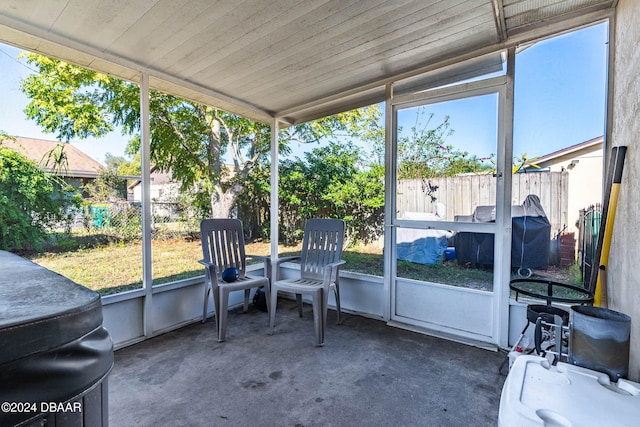 sunroom / solarium featuring plenty of natural light