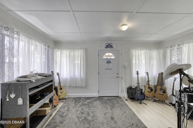 1970 Red Cedar Cir S, Daytona, FL 32119 - foyer entrance featuring baseboards, a textured wall, and wood finished floors