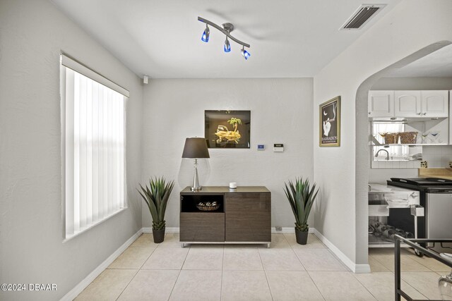 interior space with light tile patterned flooring