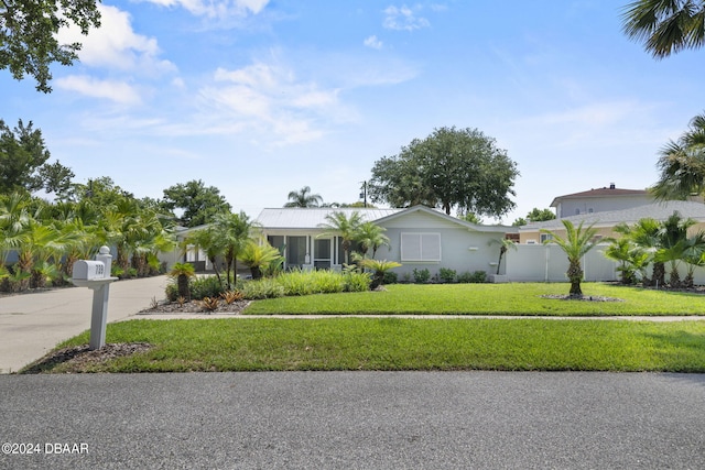 view of front of house with a front lawn