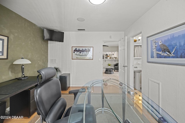 office area featuring light hardwood / wood-style floors