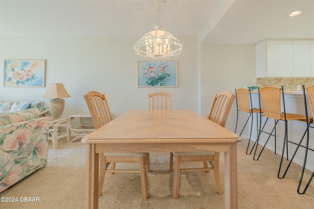 4 Oceans W Blvd Unit 407B, Daytona Beach Shores, FL 32118 - dining space with light carpet, a chandelier, and recessed lighting