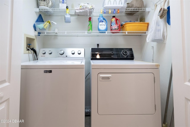 laundry room featuring independent washer and dryer